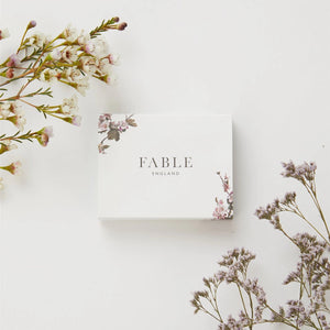 Fable England matchbox-style gift box with floral details, perfect for gifting.