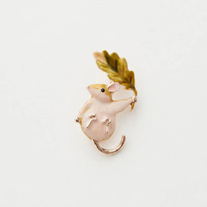 Front View: Fable England Enamel Dormouse Brooch – hand-painted dormouse holding an oak leaf with rose gold detailing.