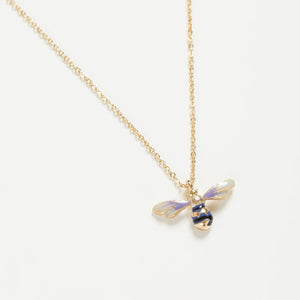 Close-up of the Fable England Enamel Short Bee Necklace – A delicate gold-plated chain with a hand-painted enamel bee charm, featuring intricate carved details.