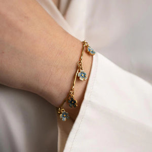 Model wearing the Forget Me Not Bracelet, showcasing its elegant fit on the wrist.