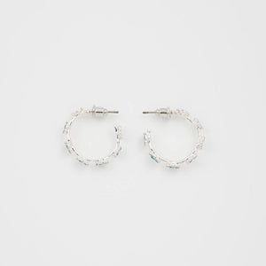 Back view of Fable Forget-Me-Not stud hoop earrings showing polished silver finish and floral detail continuing around the hoop.