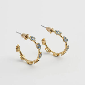 Pair of Fable England Forget-Me-Not Stud Hoop Earrings with gold-plated finish and hand-painted blue floral details.