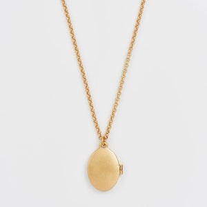 Back view of Robin & Blackberry Gold Oval Locket Necklace in smooth gold finish.