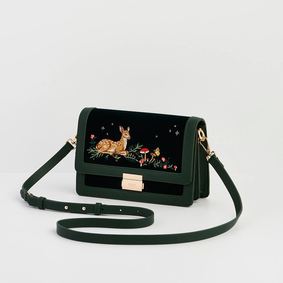 Side view of Fawn Embroidered Green Crossbody Bag showing adjustable green strap and detailed embroidery.