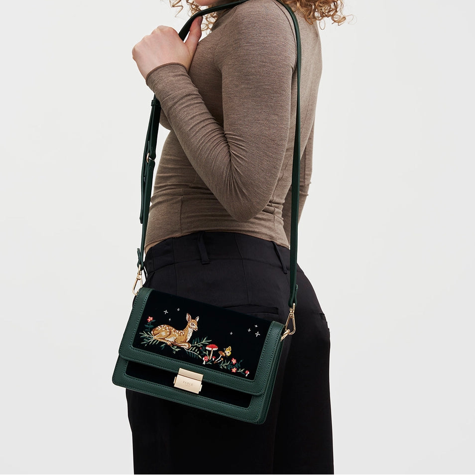 Model wearing Fawn Embroidered Green Crossbody Bag across the shoulder, showing scale and fit.