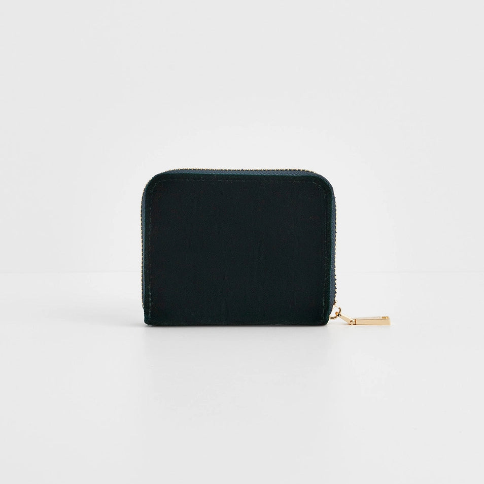 Back view of green fawn embroidered purse showing plain reverse.
