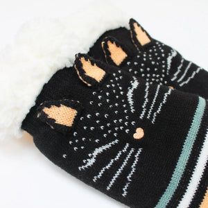 Close-up of 3D cat face with ears on the Feline Slipper Socks.