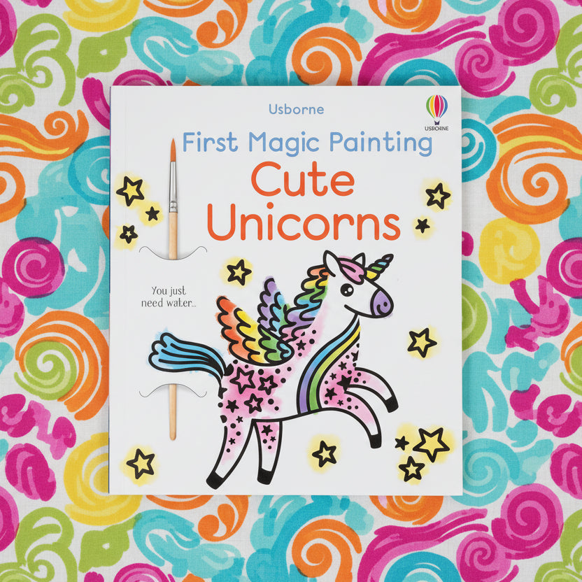First Magic Painting Cute Unicorns book cover with colourful spiral design