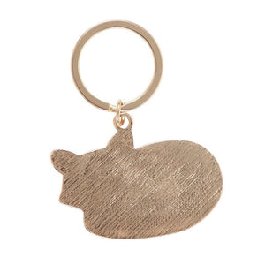 Back of Freddie Fox enamel keyring showing brushed gold metal finish.