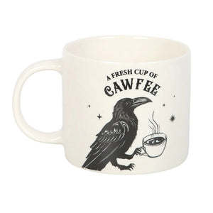 Front view of Fresh Cup of Cawfee Raven Mug showing raven illustration and stars.