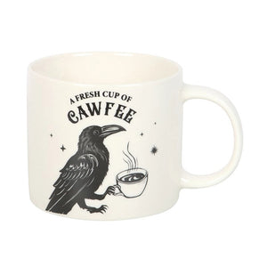 Alternate angle of gothic raven coffee mug with bold black artwork on white ceramic.