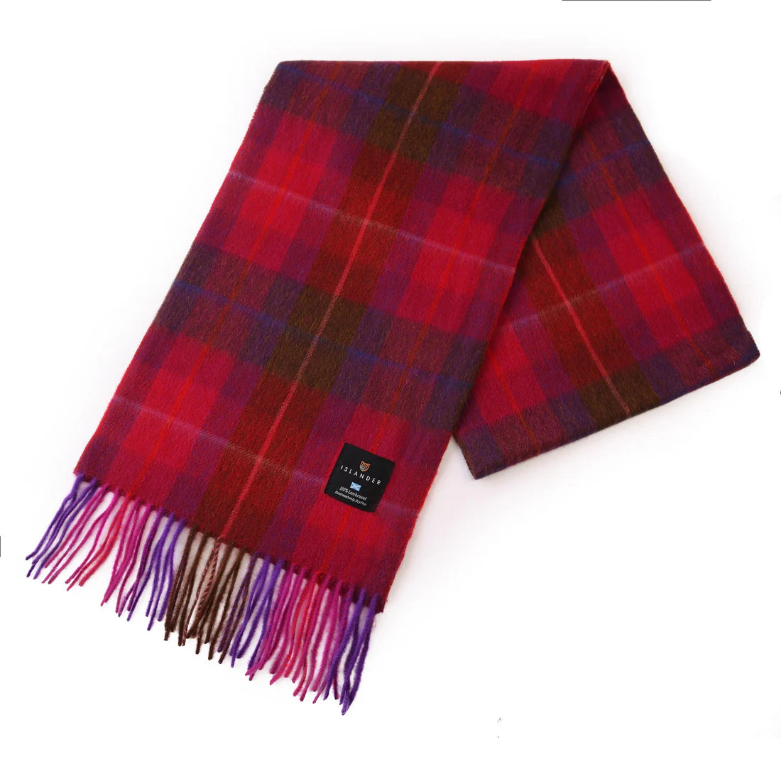 Folded fuchsia red tartan lambswool scarf on white background.