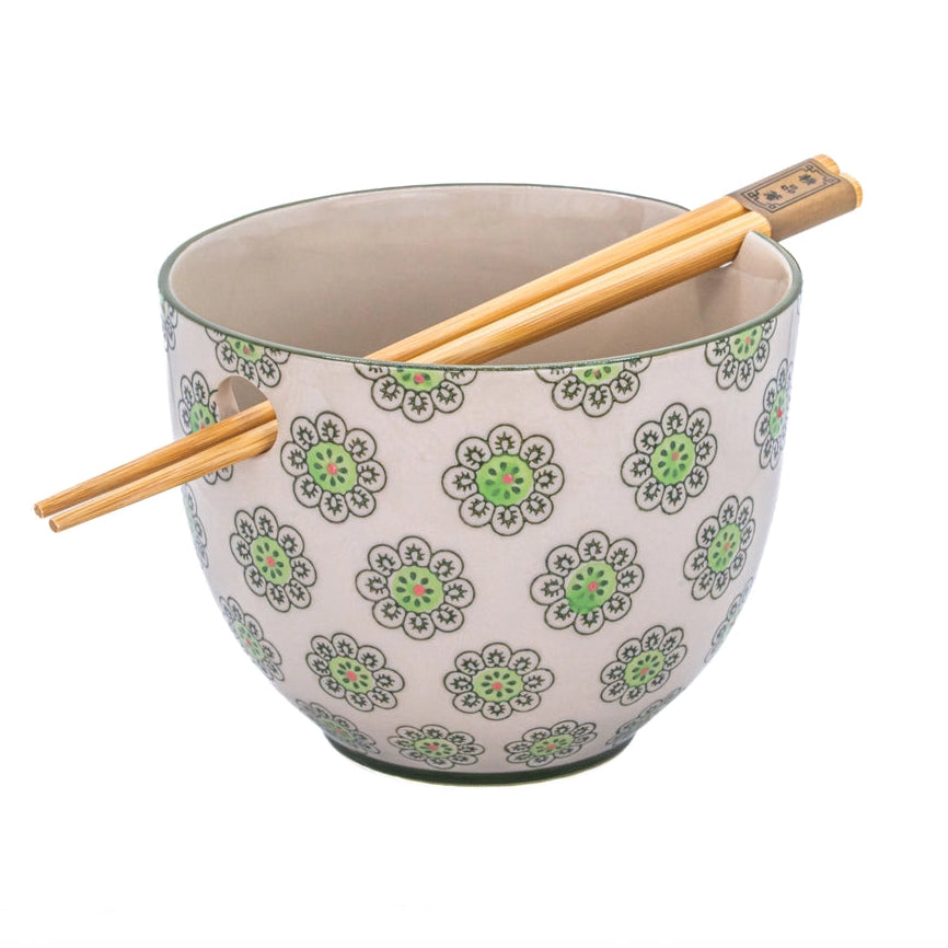 Geometric print green noodle bowl with floral-inspired pattern and matching wooden chopsticks, stoneware kitchenware.