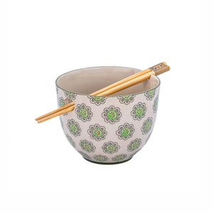 Geometric print green noodle bowl with floral-inspired pattern and matching wooden chopsticks, stoneware kitchenware.