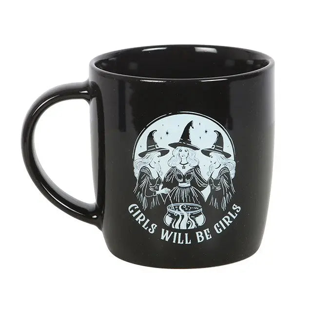 Front view of gothic black mug featuring three witches and text ‘Girls Will Be Girls’.