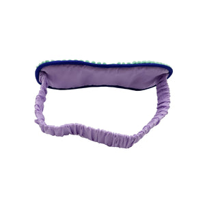 Side angle of Go Away I’m Busy eyemask highlighting purple elastic band and soft finish.