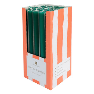 Pack of green candles in a striped box on a white background