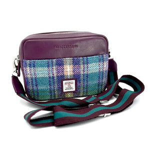 Green and Purple: Harris Tweed Camera Bag in green and purple with a purple vegan leather trim and an adjustable purple and green strap.