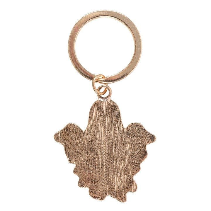 Back of Halloween ghost keyring showing textured gold metal finish – Groovy Ghost charm detail