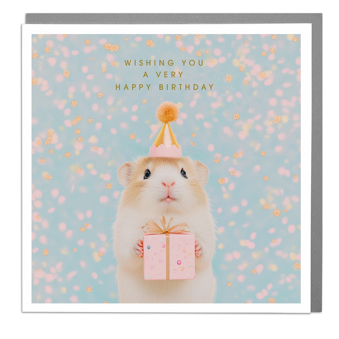 Guinea Pig Birthday Card with foil detail – cute guinea pig in party hat holding a gift on pastel confetti background.