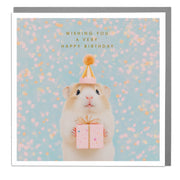 Guinea Pig Birthday Card with foil detail – cute guinea pig in party hat holding a gift on pastel confetti background.