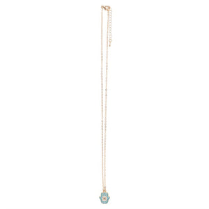 Full view of gold-tone Hand of Hamsa necklace laid flat with clasp and extension chain visible.
