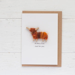 Handmade Highland Cow greetings card featuring a handcrafted Hairy Coo on a white card with kraft envelope.