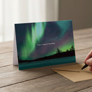 Happy Birthday Aurora card with Northern Lights over starry forest scene