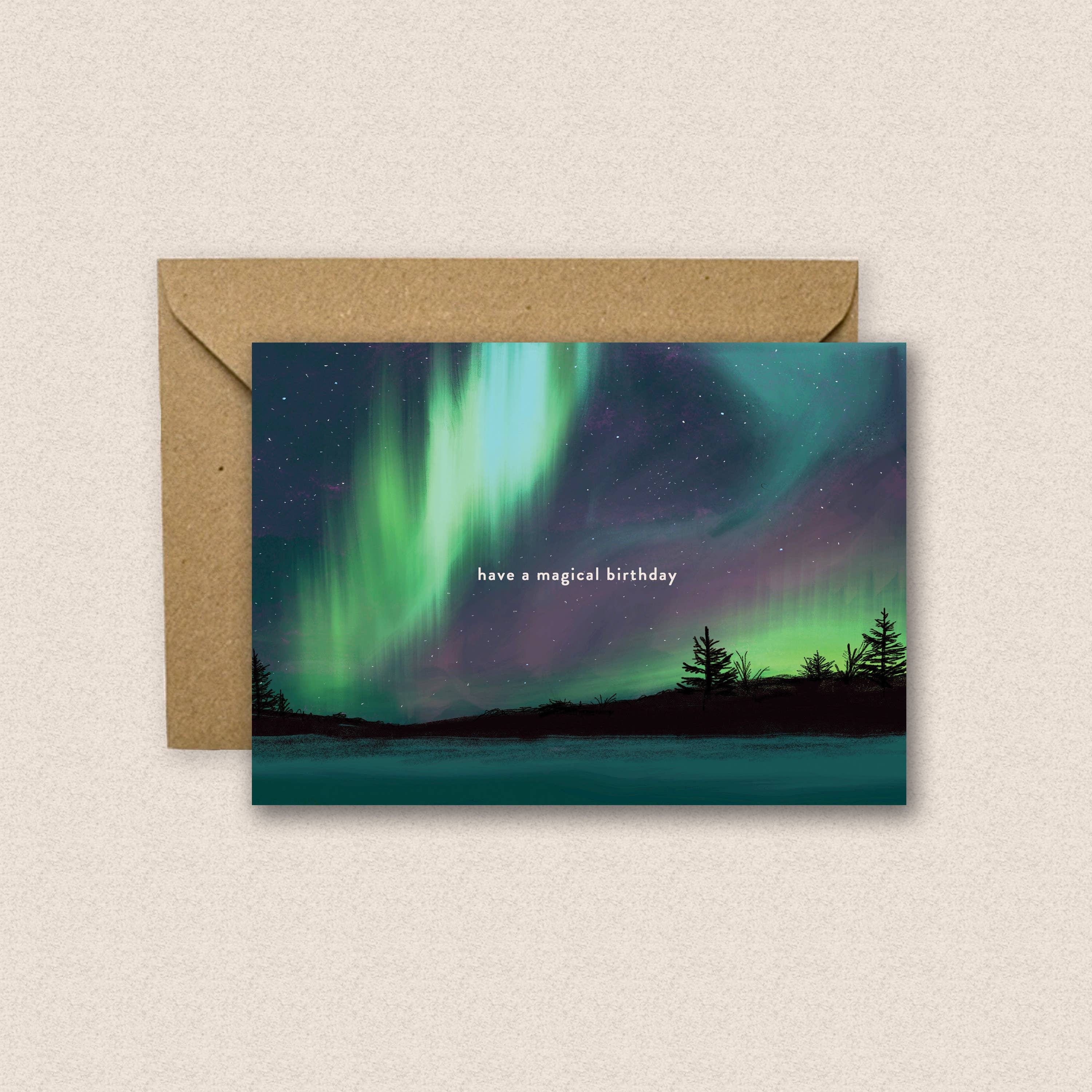 Happy Birthday Aurora card with kraft envelope flat lay presentation