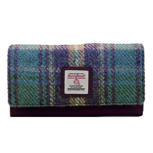 Green/Purple Envelope Purse: A vibrant Harris Tweed envelope purse in green and purple with purple vegan leather trim