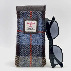 Harris Tweed Glasses Sleeve in Blue & Brown. Soft lining protects eyewear from scratches and dust. Secure snap closure keeps glasses safe.