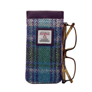 Harris Tweed Glasses Sleeve in Green & Purple. Soft lining protects eyewear from scratches and dust. Secure snap closure keeps glasses safe.