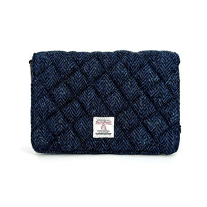 Front view: Harris Tweed Quilted Shoulder Bag in blue highlighting the quilted tweed.