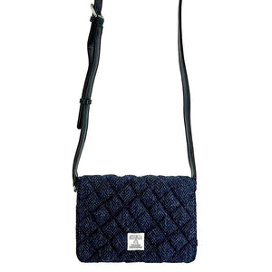 Strap view: Harris Tweed Quilted Shoulder Bag in blue with strap extended, showcasing the adjustable length.