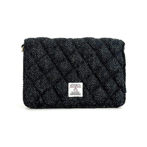 Front view: Harris Tweed Quilted Shoulder Bag in charcoal highlighting the quilted tweed.