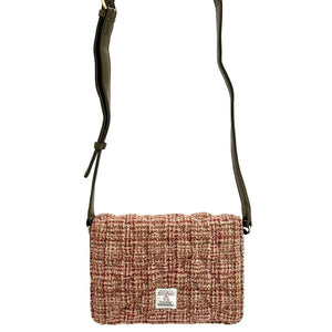 Strap view: Harris Tweed Quilted Shoulder Bag in maple with strap extended, showcasing the adjustable length.