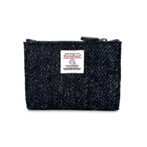  Front view: Harris Tweed Slim Purse in charcoal, highlighting the quilted design.