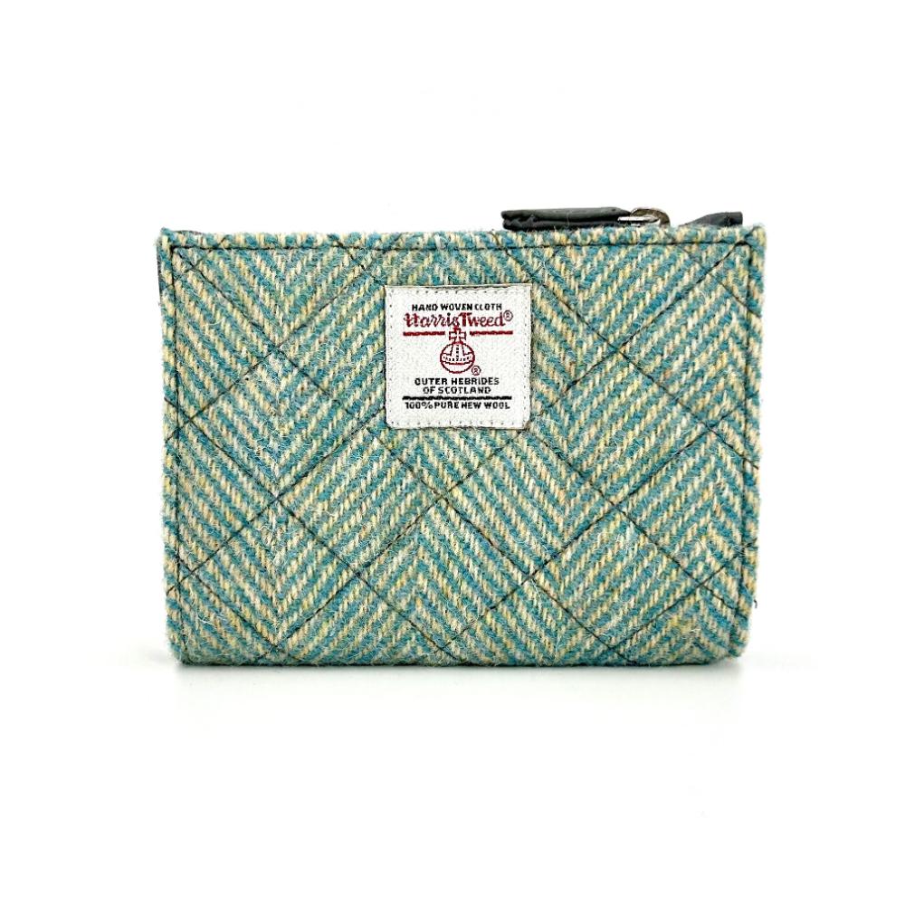 Front view: Harris Tweed Slim Purse in turquoise, highlighting the quilted design.