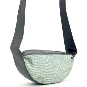 Back view: Harris Tweed Sling Bag in turquoise.