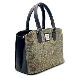 Harris Tweed Top Handle Bag in Country Green, featuring Black vegan leather trim.