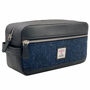 Harris Tweed Washbag in Blue Herringbone with external zip compartment. Spacious interior for all your toiletries, cosmetics, or skincare essentials.