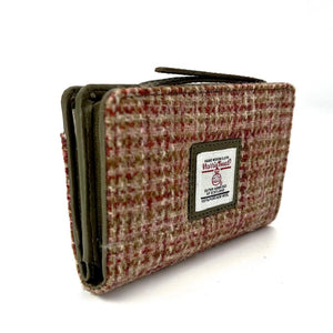 Angled View: Harris Tweed Zip Purse in luxurious Maple Tweed with Olive vegan leather trim.