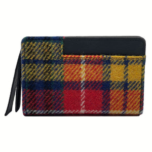 Saffron: Harris Tweed Zip Purse in vibrant Saffron Tweed with Black vegan leather trim.