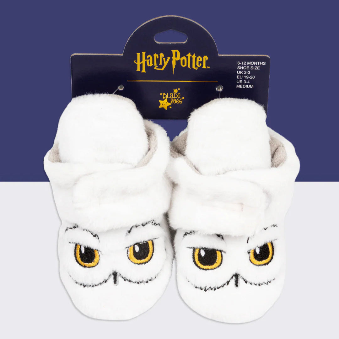 Packaged pair of Harry Potter™ Hedwig Baby Booties displayed with official Harry Potter branding.