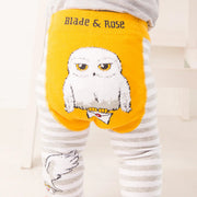 Baby wearing Harry Potter™ Hedwig leggings with yellow owl design on bum.