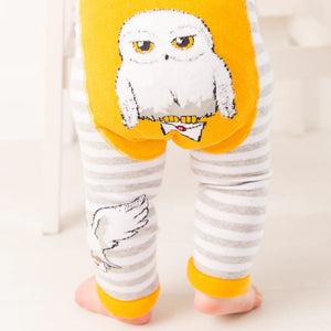 Back view of Harry Potter™ Hedwig striped baby leggings with Hedwig motif.
