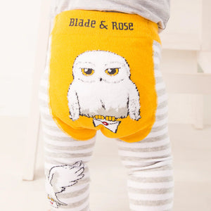 Baby wearing Harry Potter™ Hedwig leggings with yellow owl design on bum.