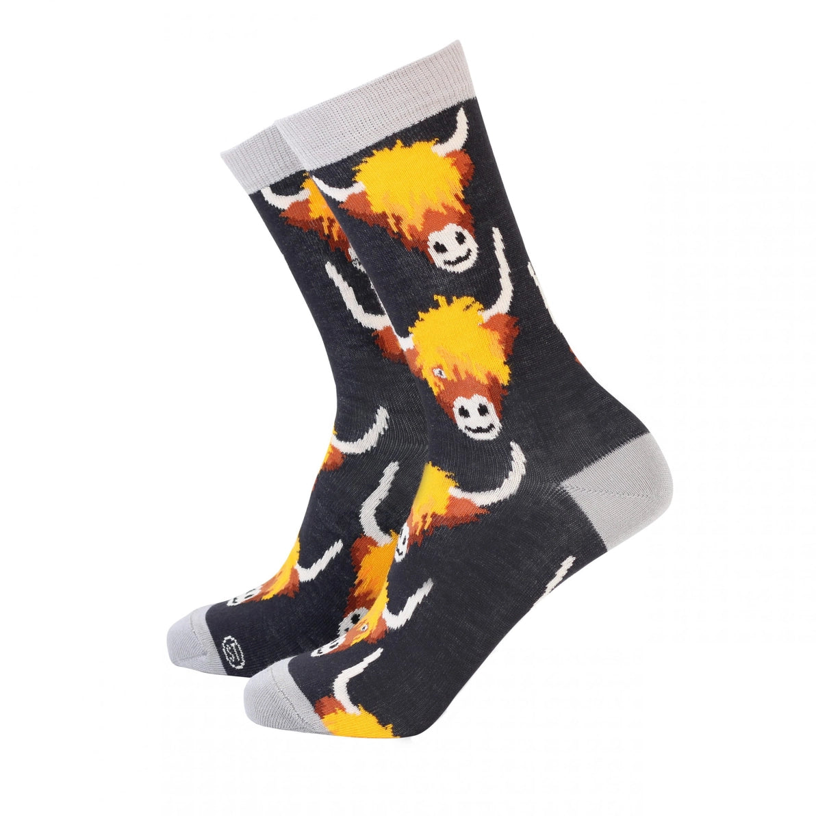 Women’s bamboo socks with Highland cow design in black and grey with yellow and orange detail.