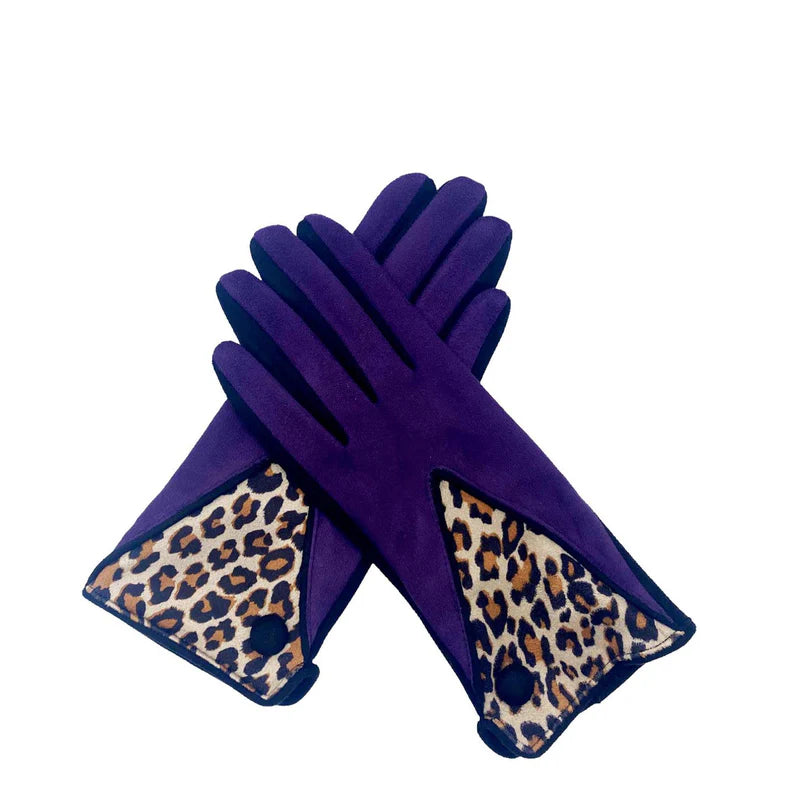 Pair of berry leopard gloves crossed in flat lay style showing bold print cuffs.