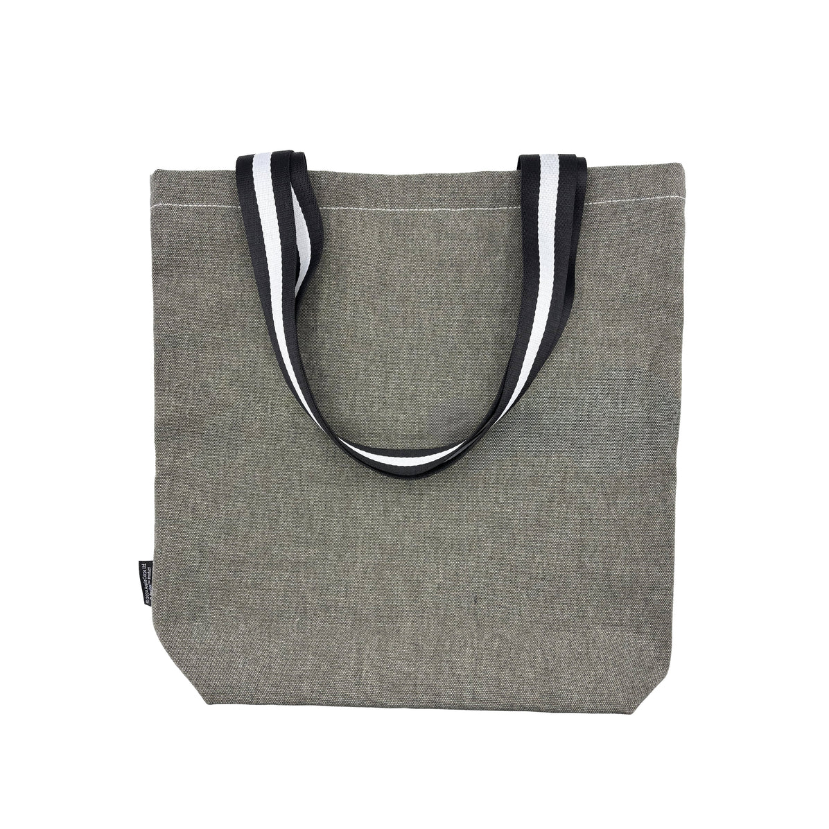 Back view of plain grey-washed canvas Beatles tote bag with black-and-white shoulder straps.